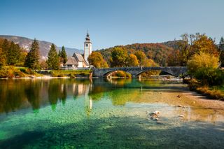 Bohinj Lake, Church of St John the Baptist. Triglav National Park, Julian Alps, Slovenia