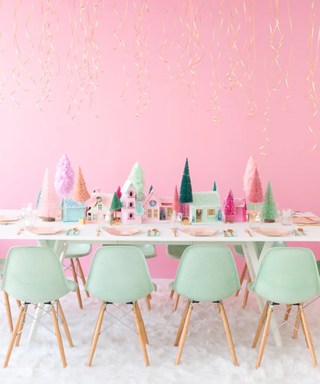 A pastel Christmas village tablescape