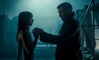 ANA DE ARMAS as Joi and RYAN GOSLING as K in Alcon Entertainment's action thriller "BLADE RUNNER 2049," a Warner Bros. Pictures and Sony Pictures Entertainment release, domestic distribution by Warner Bros. Pictures and international distribution by Sony Pictures.