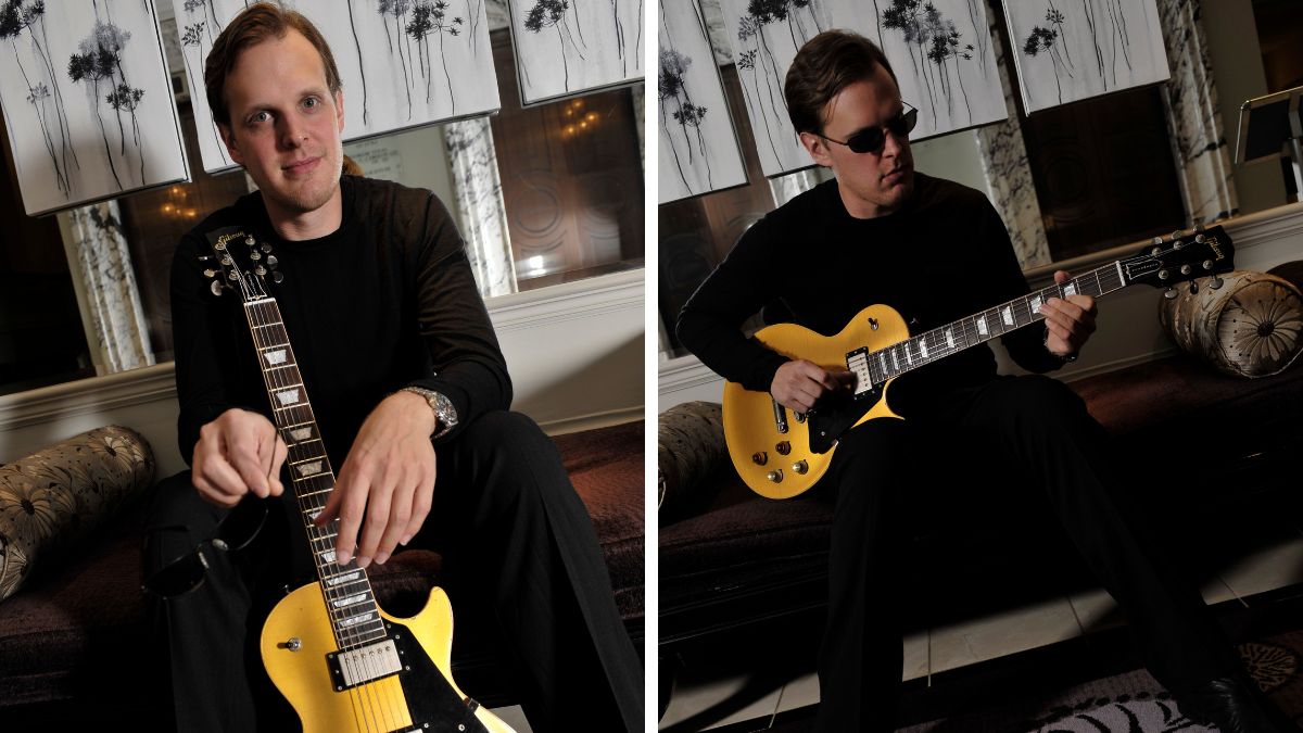 Portrait of American blues-rock musician Joe Bonamassa posing with his signature Les Paul Goldtop Outfit guitar, taken on January 27, 2009 in London