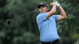 Byeong Hun An of South Korea plays his shot from the seventh tee during the first round of the FedEx St. Jude Championship in 2023