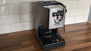 The side view of the Gaggia Classic on a kitchen countertop