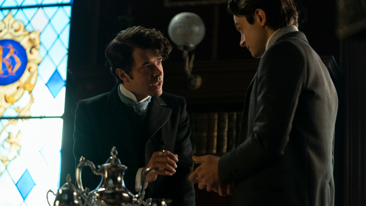 Harry Richardson stands speaking passionately to Ben Ahlers in The Gilded Age S3 E1 "Who Is In Charge Here?"