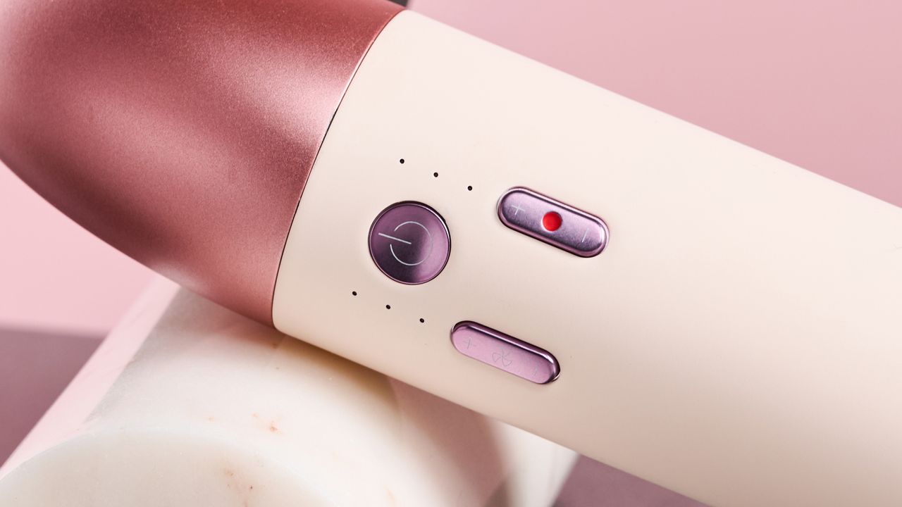Close up of control buttons on Dyson Supersonic r hair dryer