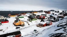 Houses along the coastline in Nuuk, Greenland.