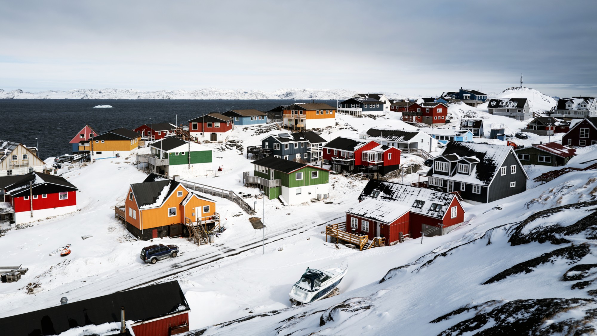 Houses along the coastline in Nuuk, Greenland.