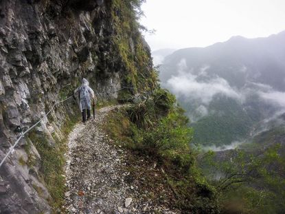 A hiker braves the Zhuilu Old Trail at Taroko National Park in Taiwan.