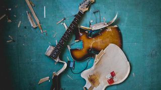 an smashed acoustic guitar