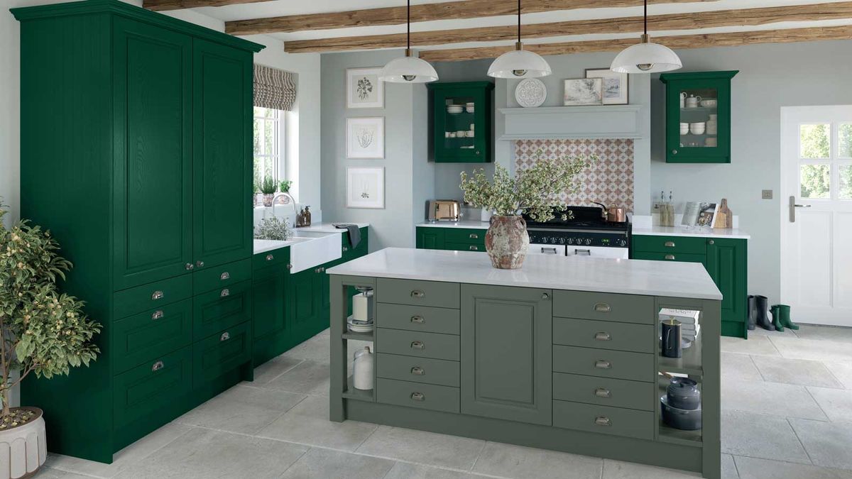 two-tone green kitchen with stone flooring 