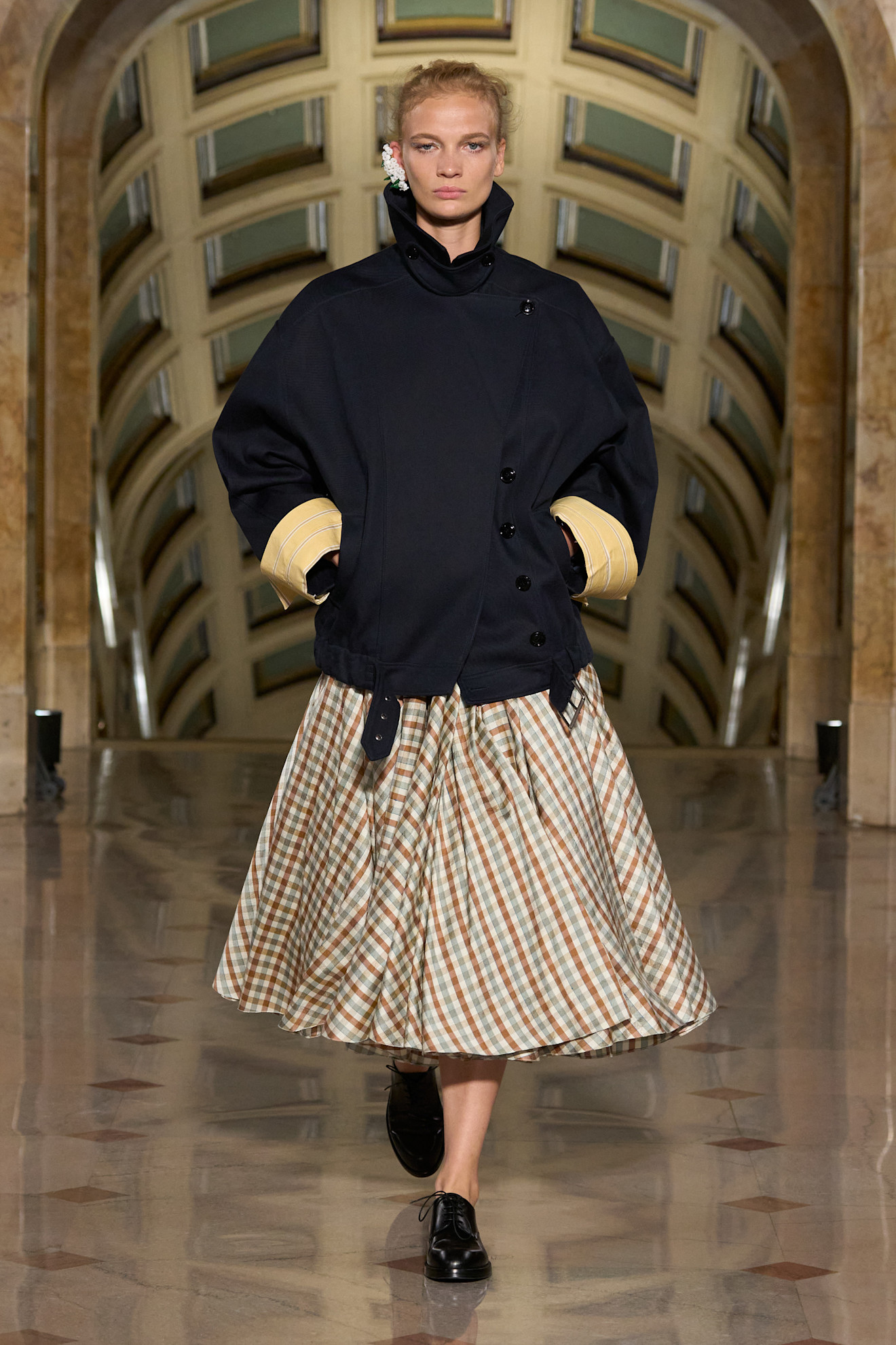 Altuzarra models wearing coats on the 2027 runway