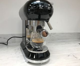 Smeg espresso machine making an americano