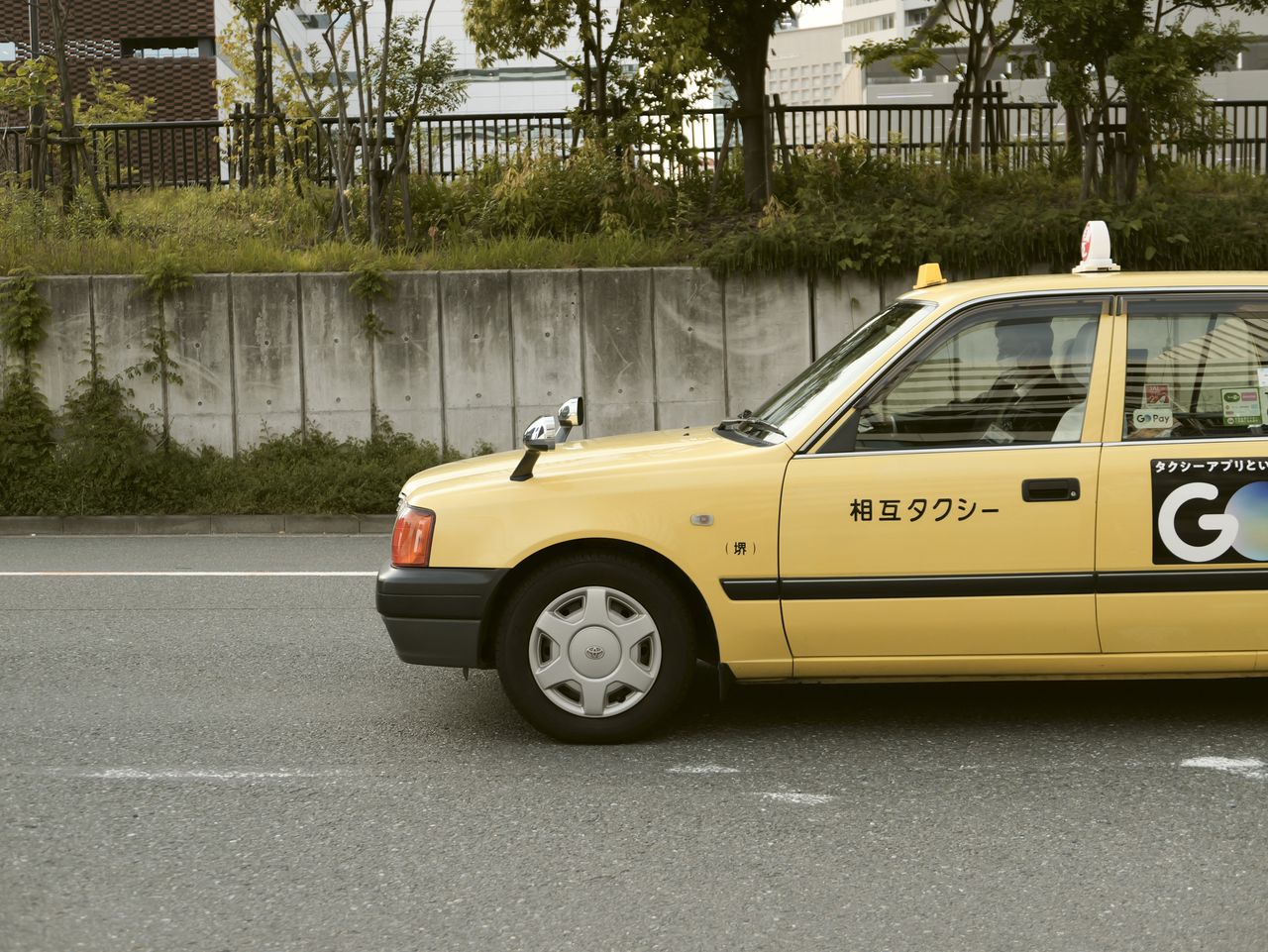 Sample image taken with the Panasonic Lumix L10; yellow taxi on road in Osaka