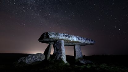 Lanyon Quoit, Cornwall, UK - stock photo Situated in largely unpopulated and treeless Cornish landscape between Madron and Morvah, Lanyon Quoit, along with other Cornish dolmens, dates back to the Neolithic period (3500-2500BC), predating both the pyramids in Egypt and metal tools. 