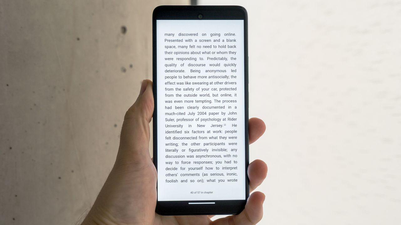 TCL 50 XE NXTPAPER phone in Ink mode showing ebook.