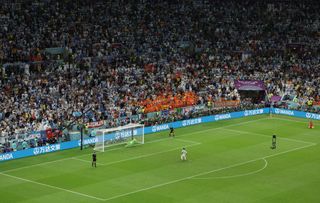 Lautaro Martinez of Argentina scores the team's fifth and winning penalty in the penalty shoot out during the FIFA World Cup Qatar 2022 quarter final match between Netherlands and Argentina at Lusail Stadium on December 09, 2022 in Lusail City, Qatar.