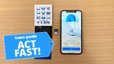 Visible welcome kit shown next to an iPhone