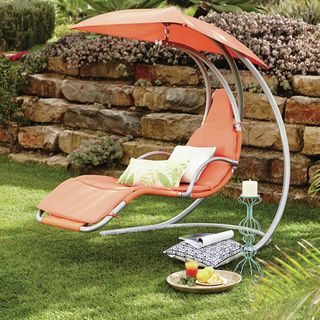 tropical giro chair in garden