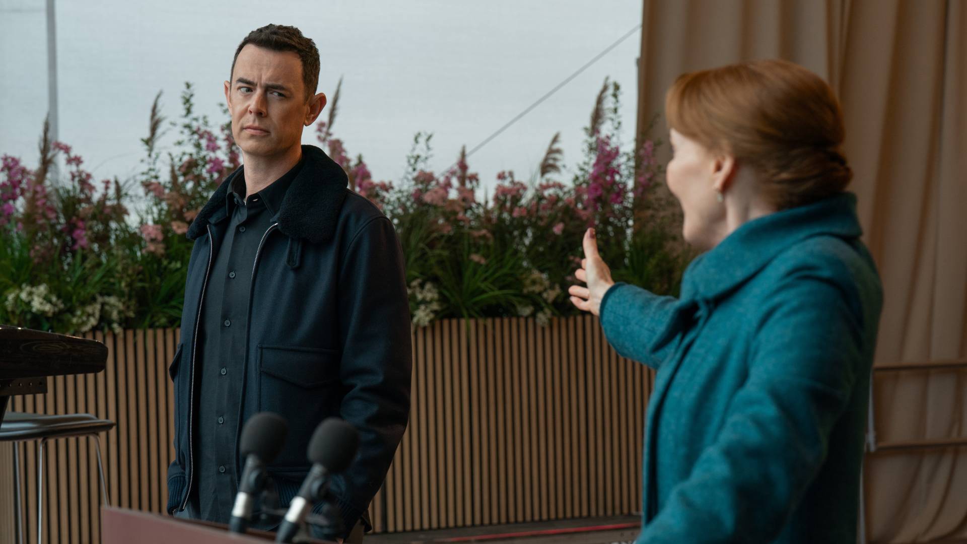 Colin Hanks as Per Stenson and Laura Innes as Senator Rosalind Thurman on stage in Silo season 3 episode 9