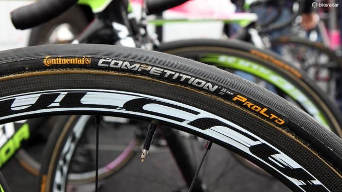 More wider-profile tires, this time on the bikes of Lampre-Merida. Mounting them to correspondingly wider rims would be a better match, though