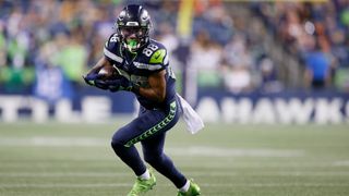 Wide receiver Cade Johnson #88 of the Seattle Seahawks in action against the Denver Broncos during an NFL preseason game at Lumen Field on Aug. 21, 2021 in Seattle, Washington.