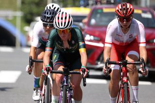 LR Namibias Vera Looser South Africas Carla Oberholzer and Polands Anna Plichta ride in a breakaway group as they lead the womens cycling road race of the Tokyo 2020 Olympic Games after the race start at Musashinonomori Park on the outskirts of Tokyo Japan on July 25 2021 Photo by MICHAEL STEELE POOL AFP Photo by MICHAEL STEELEPOOLAFP via Getty Images
