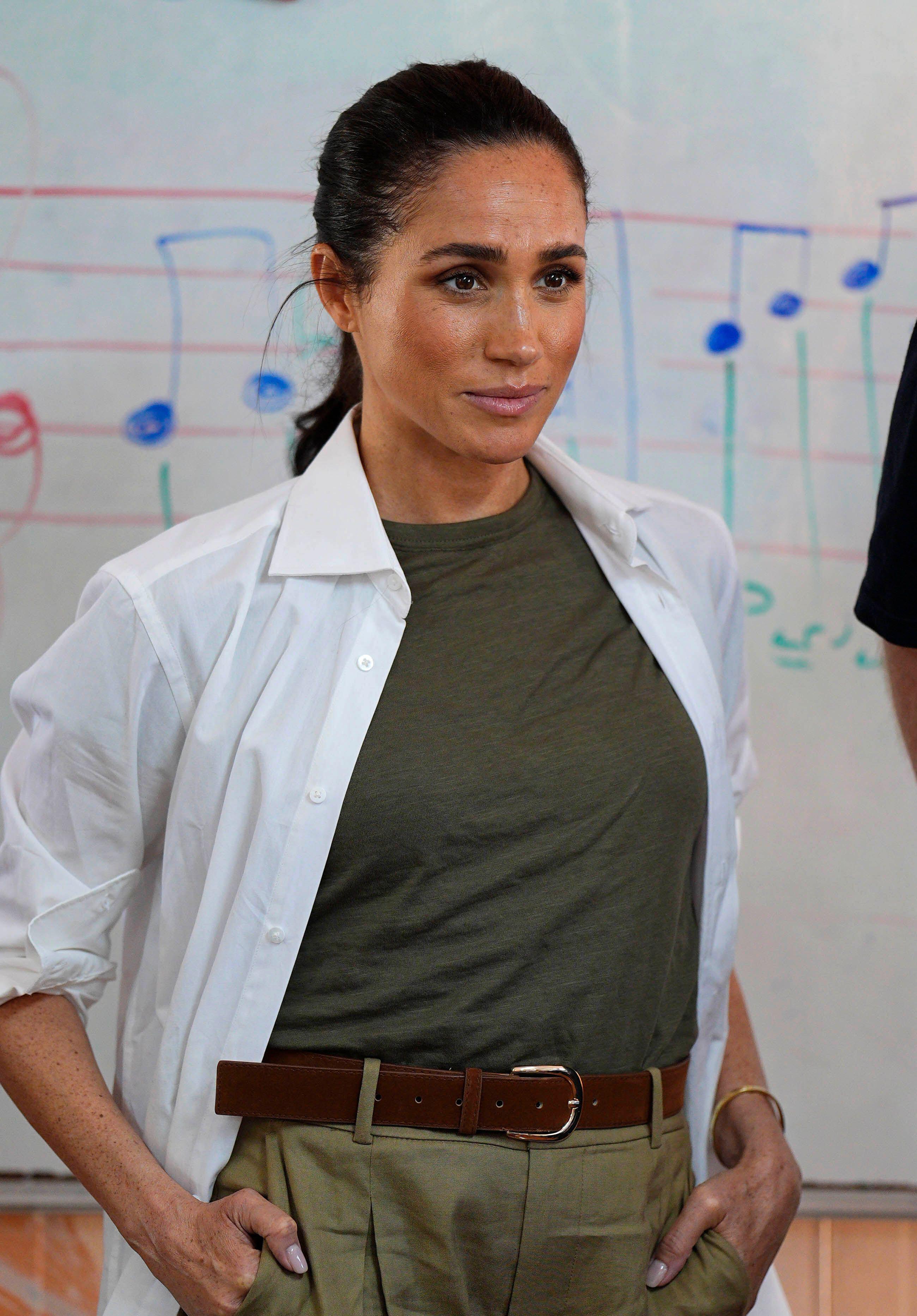 3DW5B2Y The Duchess of Sussex listens to a music class during a visit to the QuestScope Youth Center at the Za'atari refugee camp, home to displaced Syrians, near Mafraq in northern Jordan. Picture date: Wednesday February 25, 2026.