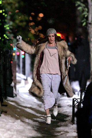 Carrie Bradshaw wearing pyjamas and fur coat