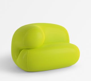 Neon yellow armchair with soft forms by Monling Le