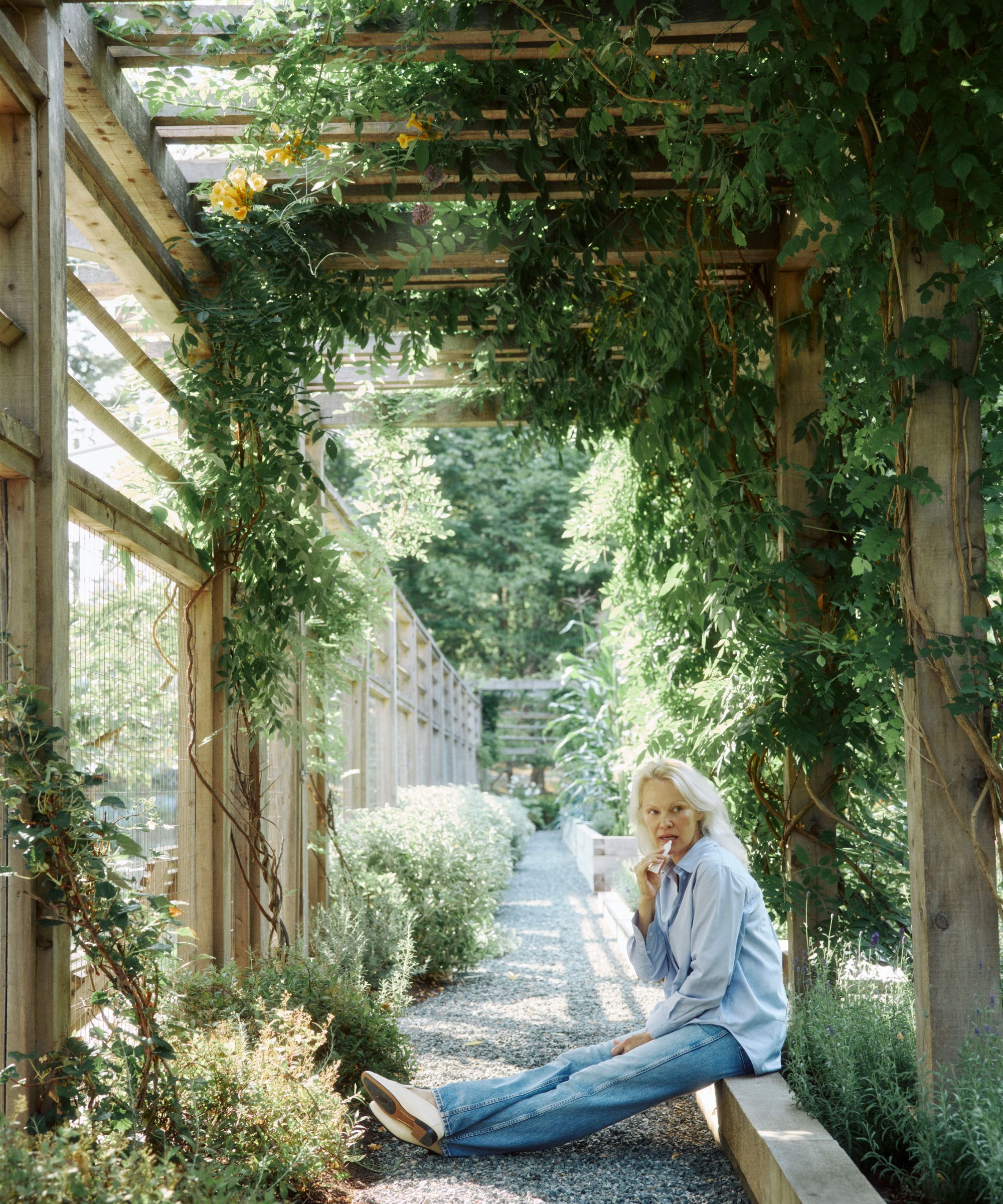 Pamela Anderson in her garden