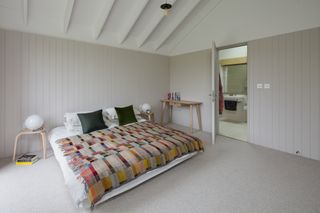 timber cladding in master bedroom leading to en suite