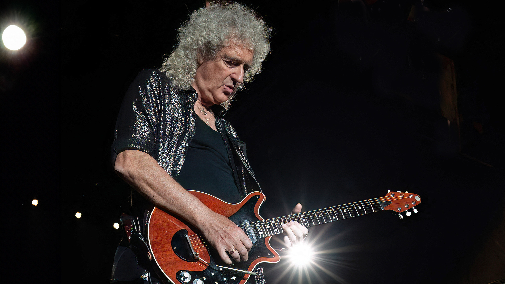 British musician Brian May of band Queen + Adam Lambert, performs at the Circuit of the Americas in Austin, Texas, on October 21, 2023, on the eve of the United States Formula One Grand Prix.
