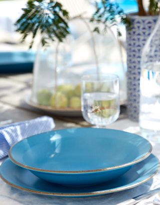 Blue plates in a summery tablescape