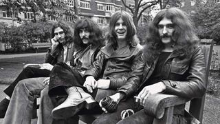 Black Sabbath in 1970, sitting on a park bench