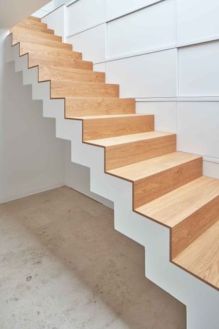 White and wooden internal stairs