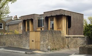 side view celebrating intricate brickwork at Southwark brick house by Satish Jassal