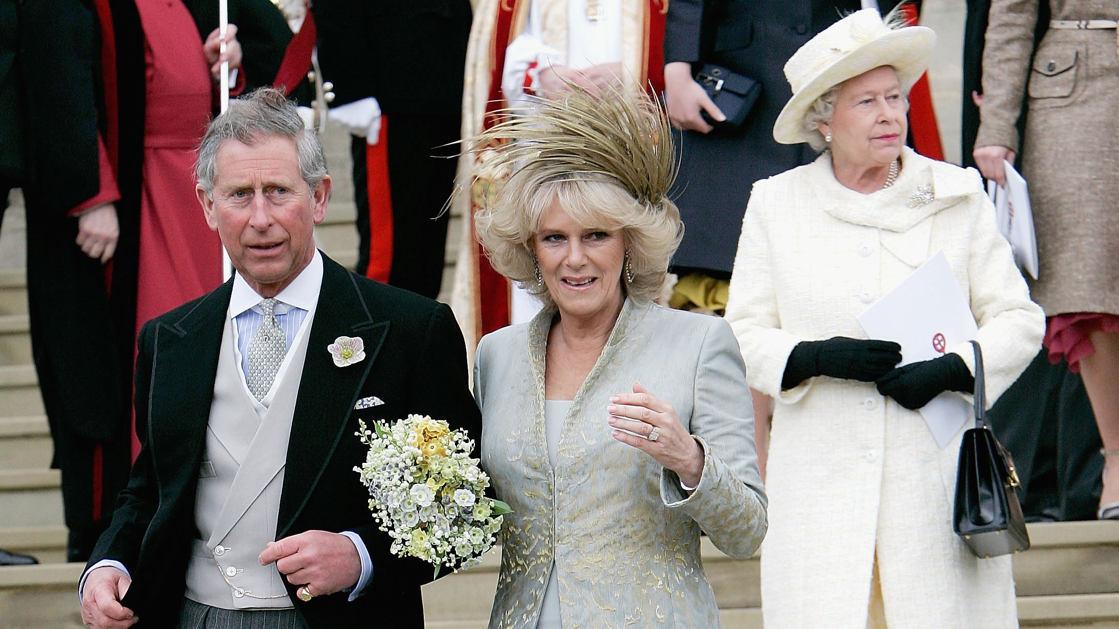 King Charles and Queen Camilla on their wedding day, with Queen Elizabeth in the background, at the Service of Prayer and Dedication on April 9, 2005