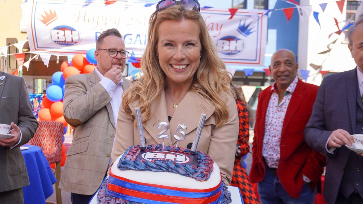 Bargain Hunt celebrates its 25th birthday with a cake held by Christina Trevanion