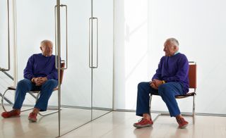 Portrait of architect Richard Rogers, looking in a mirror