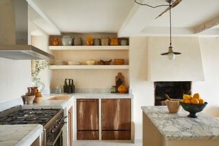 Rustic Provencal-style wooden kitchen in 16th century French townhouse in Saint-Paul de Vence