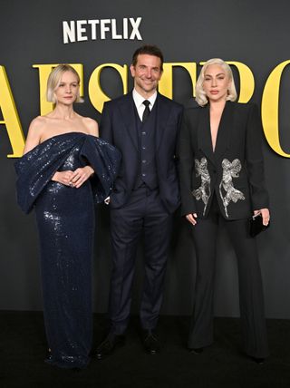 Carey Mulligan, Bradley Cooper, and Lady Gaga at the photo call for Maestro on December 12, 2023.