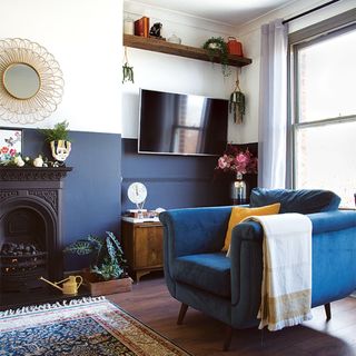 living room with blue and white half wall
