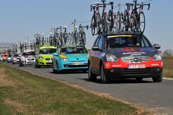 Team cars loaded up with bikes during the stage