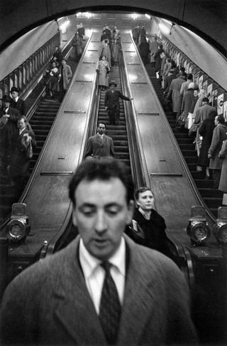 Black and white photo-People on Baker Street underground station London.