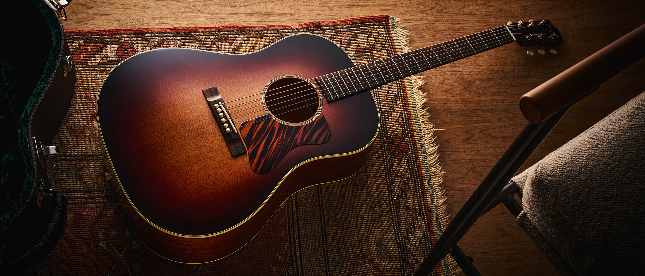 Bourgeois Slope D Standard T/S: Inspired by the J-45, this Touchstone series acoustic has. a beautiful high-gloss finish with a tiger-stripe pickguard