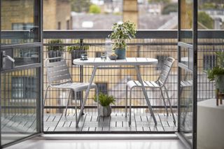 bistro set on a small balcony space