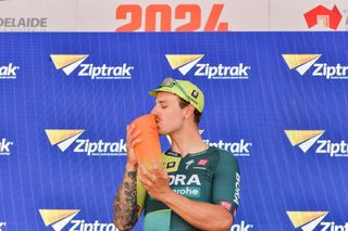 Bora - Hansgrohe rider Sam Welsford from Australia celebrates after winning the first stage of the Tour Down Under cycling race in Adelaide on January 16, 2024. (Photo by Brenton EDWARDS / AFP)