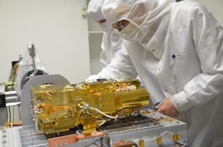 Researchers test the SuperCam mast unit at the Laboratory for Space Science and Astrophysical Instrumentation (LESIA) outside of Paris.