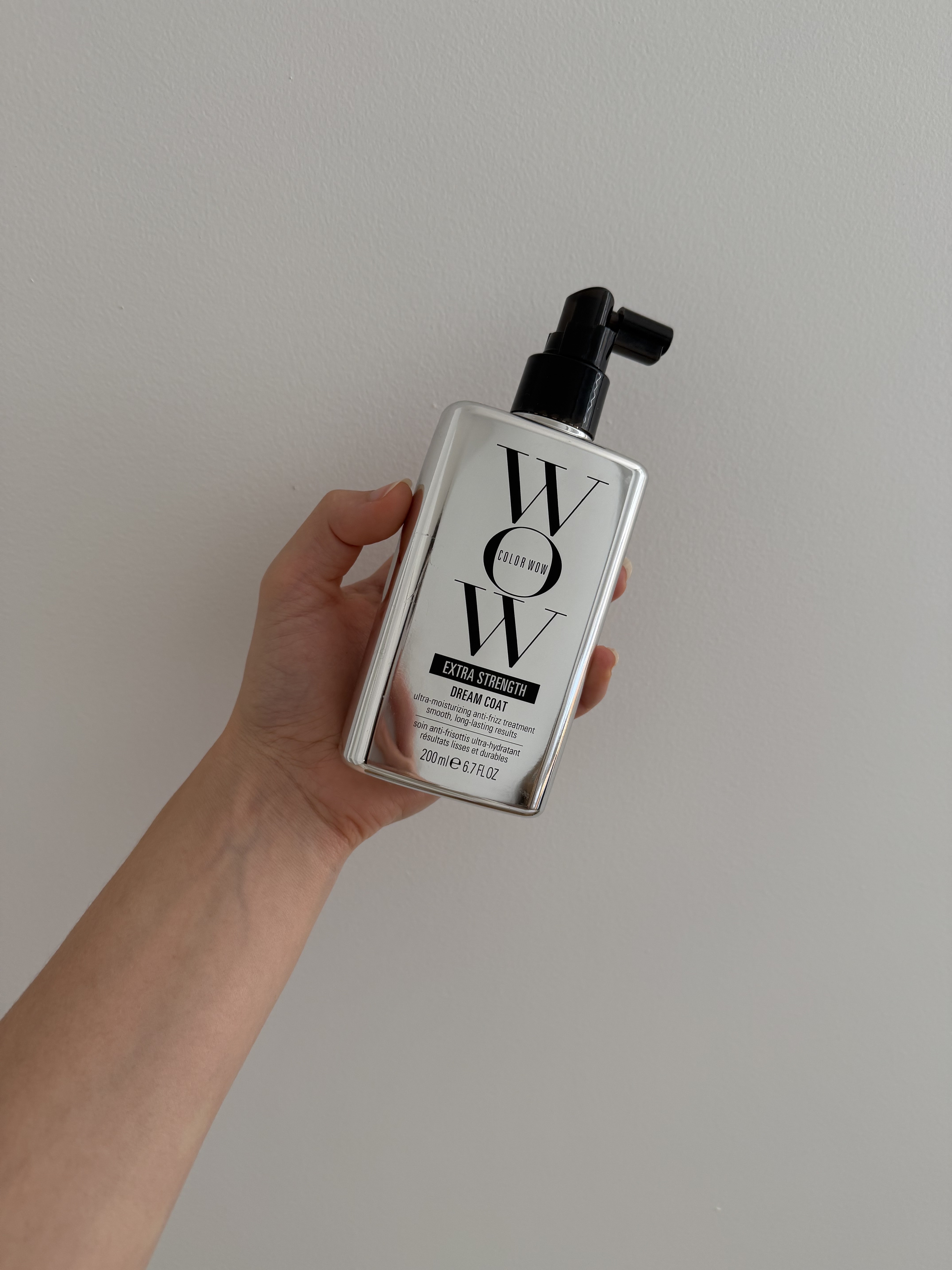 Jamie Schneider testing Color Wow's Dream Coat spray