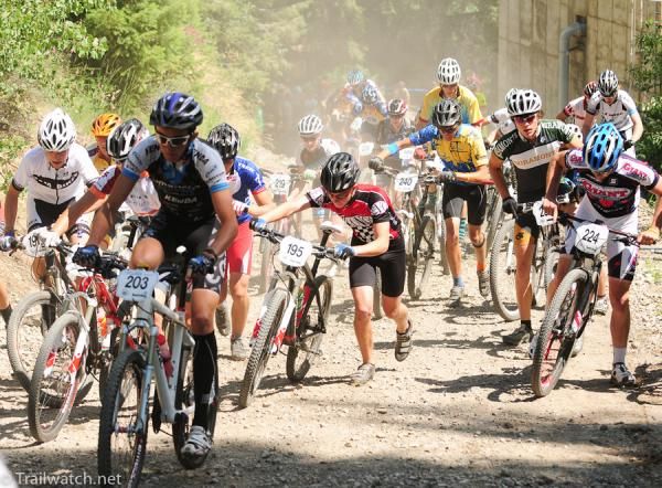 Many of the 15-16 men got caught up in a logjam that forced them to push their bikes