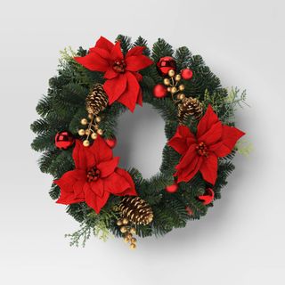 Mixed greenery and poinsettia flowers Christmas wreath from Target.